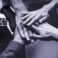 Team of business people stacking hands